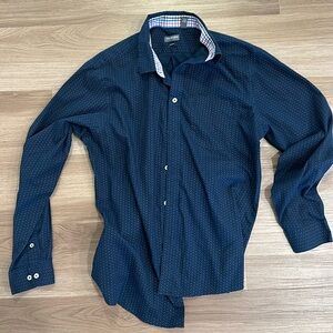 Van Heusen (never tuck) button down. Slim fit. L 16 - 16 1/2. Blue/white.